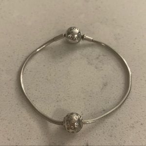 Authentic PANDORA Essence bracelet with “Joy” charm